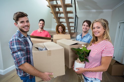 Office relocation planning in Fulham with moving boxes and desks